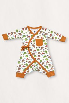 DESCRIPTION Introducing our adorably unique long sleeve Baby Kimono romper in Meadow, a delightful gender-neutral outfit featuring a vibrant unisex pattern that will stand out in baby's wardrobe. Crafted from the finest Organic Pima Cotton, this kimono romper promises a long-lasting soft and gentle touch against your baby's sensitive skin. This outfit is the perfect blend of comfort, quality, and color, making it an absolute must-have for your baby that will last wash after wash. Our Kimono styl Gender Neutral Outfit, Baby Kimono, Easy Wrap, Color Making, Genetically Modified, Gentle Touch, Kimono Style, Neutral Outfit, Soft And Gentle