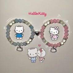 two bracelets with hello kitty charms on them