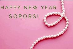 a necklace with pearls on it and the words happy new year sorors