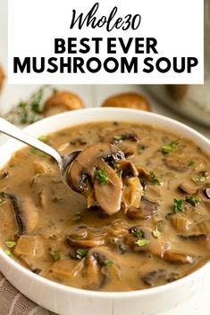 a white bowl filled with mushroom soup on top of a table