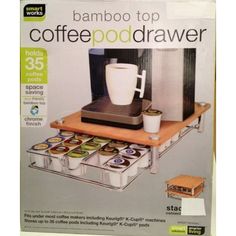 an advertisement for a coffee pod drawer with cups on it and a blender in the middle