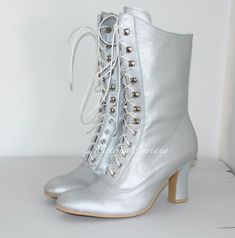 Request a Custom Order and have something made just for you! This is an individual boot execution fantastic for all seasons, great and for Victorian wedding :) Beautiful female Victorian / French High Heel Boots inspired from 1900's  booties style. All materials very qualitative Amazing Italian optic light metallic silver bright polish Leather  You can get remarkable and not expensive handmade boots.  Mid calf height: height of the heel 2,6" inch/ 7 cm length of the boot from the bottom of the s Formal Winter Lace-up Boots With Closed Toe, Formal Lace-up Boots For Winter With Closed Toe, Formal Closed Toe Lace-up Winter Boots, Formal Closed Toe Lace-up Boots For Winter, Fitted Lace-up Boots With Reinforced Heel And Closed Toe, Fitted Lace-up Wedding Boots, Leather High Heel Wedding Boots, Leather High Heel Boots For Wedding, Silver Fitted Boots For Wedding