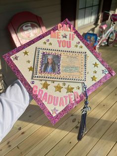 a decorated graduation cap that reads, call me if you graduated and has pictures on it