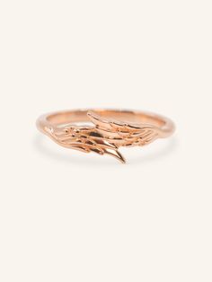 The Gold Angel Wings Ring is a beautiful symbol of protection and guidance, featuring intricately designed angel wings in 14k gold. This elegant ring offers a meaningful touch, making it perfect for those who seek a reminder of love, hope, and comfort. Wear it alone or stack it with other rings to create a unique, personal look that carries a deep significance. Angel Wings Ring, Wings Ring, Angel Wing Ring, Symbol Of Protection, Gold Angel Wings, Beautiful Symbols, Gold Angel, Bracelet Box, Comfort Wear