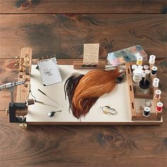 an overhead view of a hairdresser's kit on a tray