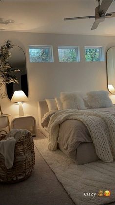 a bedroom with white walls and carpeted flooring