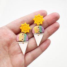 A wearable perfect summer treat! Radiate positivity and spread a little sunshine wherever you go with our Sunshine Sno-ball Earrings. Polymer Clay with gold plated stud Super lightweight and easy to wear This listing is for ONE pair of earrings. Made in South Carolina. See all of the jewelry we carry online HERE. Chalk Ideas, Radiate Positivity, Earrings Polymer, Polymer Clay Diy, Ball Earrings, Earrings Polymer Clay, Clay Ideas, Diy Clay, Polymer Clay Crafts