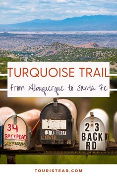 several mailboxes with the words turquiise trail from aluqua to santa fe on them