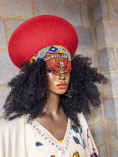 Zulu basket hat made of yarn and straw. South African headpiece Measure the circumference of your head for an exact fit Red Brimmed Festival Costume Hats And Headpieces, Red Brimmed Costume Hats And Headpieces For Festivals, Red Brimmed Festival Costume Hat, Red Brimmed Costume Hat For Festival, Red Curved Brim Costume Hat For Festivals, Red Costume Hat With Curved Brim For Festival, Red Bohemian Wide Brim Straw Hat, Bohemian Red Wide Brim Straw Hat, Red Adjustable Round Crown Hat