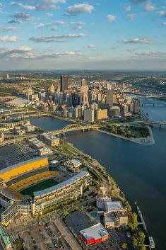 an aerial view of a city and the water