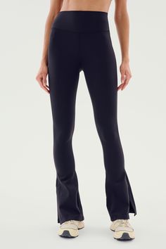 We added a stylish side split hem to our best-selling high waist Raquel. The 4-way stretch supplex fabric is supportive and opaque for a confident workout. And a sleek silhouette that shapes the waist line, elongates and slims on the body. BEST FOR: yoga, CrossFit, barre, Pilates and gym workouts. Flare Leggings Outfit, Barre Pilates, Yoga Pants Outfit, Flare Leggings, Side Split, Split Hem, Outfits With Leggings, Crossfit, Yoga Pants