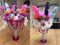 two vases filled with colorful items on top of a wooden table