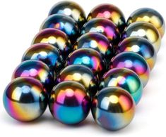 a bunch of shiny metallic balls sitting on top of each other