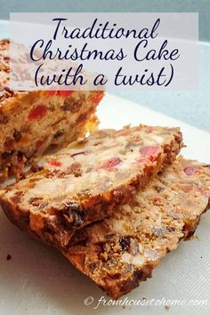 traditional christmas cake with a twist is cut in half on a white plate and has text overlay that reads traditional christmas cake with a twist