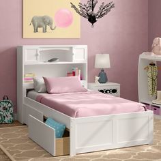 a child's bedroom with pink walls and white furniture