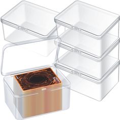 three plastic storage containers with lids on top