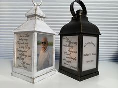 two small lanterns sitting next to each other