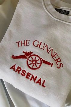 a white shirt with the words, the gunvers's arsenal on it