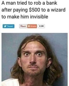 a man with long hair wearing a white shirt and looking at the camera while he is in jail