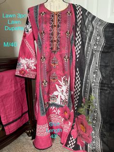 Stitched & Ready to wear LAWN 3 piece- Plain Lawn Shalwar with elastic waist, Embroidered Lawn Kameez; Printed CHIFFON Dupatta with 4 sides pico. Color- Multi. Very comfortable, Soft and pretty regular/casual wear suit. Size- Medium, Bust- 40", Shirt Length-43", Shalwar Length-39" (approximately) 👉🏼Color may slightly vary due to lighting sources/camera resolution or your monitor settings.  👉🏼Shalwar design may not be exactly the same as picture. Please send me a message If you want full measurements. Fabric quality, embroidery and stitching quality is very good. These are the actual pictures of the dress the buyer will receive in the mail. So buy with confidence. From a pet/smoke free, clean and oder free environment. Don't forget to see my other listings for more beautiful items! :) T Shalwar Design, Suit Pakistani, Embroidered Suit, Chiffon Dupatta, Beautiful Items, Shalwar Kameez, Embroidery And Stitching, Print Chiffon, Large Bust