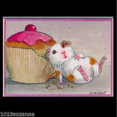 a painting of a mouse next to a cupcake