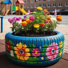 a flower pot made out of an old tire