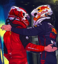 two red bull drivers hugging each other