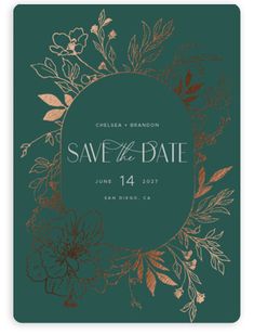 save the date card with gold foil flowers and leaves on dark green paper, featuring an oval