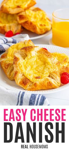 easy cheese danish on a white plate with raspberries and orange juice in the background