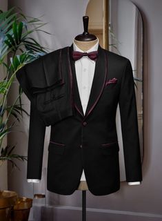 Formal elegance doesn't come more sartorially refined than in the Italian Style Black Wool Tuxedo Suit. Own a great quality Tuxedo all custom hand made just for you. Sometimes the best formal attire is all about going back to the basics and doing them well.   Tuxedos are great way to standout from the crowd, while maintaining a timeless and elegant look.   
 
 Featuring wine satin lapel, matching satin covered buttons and gentle texture at its surface, our tuxedo is a subtle fashion-forward take Luxury Fitted Three-piece Suit, Fitted Luxury Double Breasted Suit For Semi-formal Occasions, Luxury Fitted Double Breasted Suit For Semi-formal Occasions, Luxury Fitted Formal Sets, Designer Fitted Sets With Suit Collar, Luxury Fitted Double Breasted Suit For Party, Wedding Double Breasted Fitted Suit With Pressed Crease, Wedding Double Breasted Suit With Pressed Crease, Designer Fitted Formal Sets