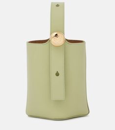 Find LOEWE Pebble Mini Leather Bucket Bag on Editorialist. Material: calf leather. Lining: leather. Made in Spain. Designer color name: Light Pear. Top handle. Includes: dust bag. Loewe Bag, Teddy Coat, Leather Bucket, Leather Bucket Bag, Leather Mules, Slingback Pump, Leather Pumps, Green Bag, White Bag