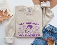 All Oopsies No Daisies Retro Sweatshirt, Funny Meme Sweatshirt, Funny Nostalgia Cat Sweater and Hoodie Thank you for visiting our Etsy shop. Take a leisurely stroll through our collection and discover the ideal sweatshirt or hoodie to elevate your style. We are excited about the opportunity to assist you and are committed to delivering a fantastic shopping experience!  HOW TO ORDER YOUR CUSTOM SWEATSHIRT OR HOODIE  1. Explore and meticulously review our captivating collection of photos. 2. Indul Cute Crewneck Designs, All Oopsies No Daisies, Vinyl Clothing Ideas, Cricut Sweatshirt Ideas, Sweatshirt Quotes, Cricut Clothing, Shirts To Make, Thrifting Vintage, Vintage Meme