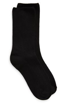 Update your sock collection with these classic crew socks featuring neat ribbing and a muted hue. Rayon/polyester/spandex Machine wash, tumble dry Imported Black Fuzzy Socks, Black Socks Aesthetic, Long Black Socks, Year Reset, Descendants Dr, Socks Aesthetic, Black Tennis Shoes, Sock Collection, Xmas Wishlist