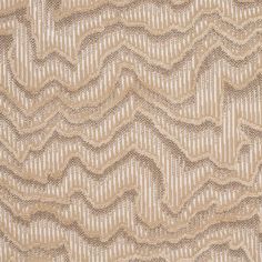 an abstract beige background with wavy lines and small dots on the fabric, as well as waves