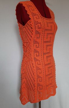 Crochet summer tunic or  beach crochet tunic  The orange tunic dress is crocheted from cotton yarn. Soft and fine natural yarn. Lovely crochet orange tunic for summer and beach. This lace cover-up has a straight style. The crochet cover-up has ties on both sides.  This beach dress mini is ideal for hot summer.  Size - S (UK 8-10, EURO 36-38).  Dummy dimensions on a photo: bust - 88 cm (34 inches), waist - 70 cm (27 inches) Hand wash in cold water, not wring out, and lay out to dry. Prepared to s Orange Crochet Dress For Vacation, Orange Crochet Dress For Beach In Spring, Orange Sleeveless Crochet Top, Handmade Sleeveless Crochet Summer Dress, Orange Crochet Beach Dress For Summer, Handmade Sleeveless Crochet Dress For Summer, Orange Crochet Dress For Summer Beach, Fitted Orange Crochet Dress For Beach, Summer Orange Crochet Top