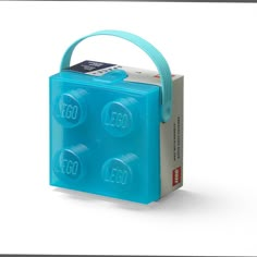 the lego bag is made out of plastic and has four small round holes in it