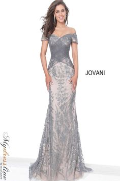 Introducing the Jovani 02083 off-the shoulder ruched bodice mother of the bride dress. This elegant gown is perfect for any formal occasion, with its beautiful off-the shoulder design and ruched bodice. The skirt is also adorned with delicate ruching, giving it a gorgeous silhouette that is sure to make you stand out on your special day. Whether you are the mother of the bride or groom, or simply a guest at a wedding, this dress will have you looking your best. Order yours today and be sure to t Mom Dresses, Lace Cape, Mother Of The Bride Dresses Long, Mother Of Bride Outfits, Bride Gown, Mother Of The Bride Gown, Mother Of Groom Dresses, Evening Dresses With Sleeves, Groom Dresses