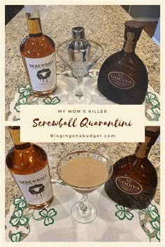 three bottles of liquor sitting on top of a counter next to a glass filled with liquid