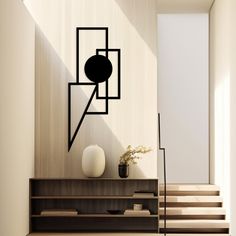 a vase sitting on top of a wooden shelf next to a stair case with a plant in it