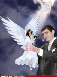 a man in a suit holding a white angel