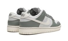 The Nike Dunk Low “Mica Green” is a casual and versatile colorway of the vintage basketball shoe.  In addition to appearing on this Dunk Low, the “Mica Green” color story has also landed on the Nike Air Max 1 and Nike Air Force 1 as part of Nike’s Spring 2023 footwear collection.  On the Dunk, the theme features a Photon-Dust-colored canvas base with Mica Green leather overlays.  A Sail leather Swoosh is found on both sides of the shoe.  A grey “Nike” logo is embroidered on the heel and a Mica G Dunk Low Mica Green, Nike X Travis Scott, Low Air Jordan 1, Jordan 8, Dunks Nike, Jordan 2, Nike Dunk High, Nike Shox, Air Huarache