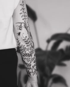 a person with a tattoo on their arm