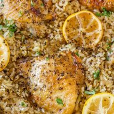 chicken and rice with lemons on the side