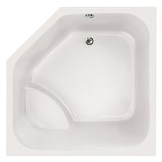 a white bath tub sitting on top of a white floor