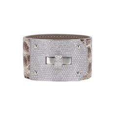 Guaranteed authentic unique limited edition Hermes Kelly Cuff Bracelet set with six interchangeable crocodile straps.Kindly read details:The diamond Kelly cuff has 493 brilliant cut round diamonds, 6.75ct, set in 18k White Gold.The Spinel bracelet has the same setting in 18 ct Rose Gold.There are six (6) crocodile straps in total to complete the set.Rose Scheherazade, Bougainvillea, Electric Blue, Black, Emerald (2 sizes) and Himalaya.Six magnificent bracelets. See Strap measurements below.All s Hermes Kelly Bag, Hermes Jewelry, Kelly Bag, Bougainvillea, High Jewelry, Bracelet Set, Electric Blue, Cuff Bracelet, Round Diamonds