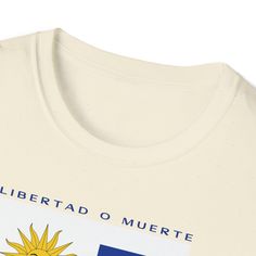 Introducing our Uruguay Retro T-Shirt, a contemporary take on casual comfort that seamlessly blends style with an international vibe. Featuring a retro style print design inspired by the national flag and crafted from exceptionally soft materials, this softstyle unisex tee is a wardrobe essential that combines a luxurious feel with unmatched durability. It's a great gift for world travel lovers and the perfect way to show off the place you love. Made with care, our shirts are 100% cotton for solid colors, while Heather colors and Sport Grey incorporate a touch of polyester for added versatility. The twill tape on the shoulders enhances durability, and with no side seams, this shirt ensures a smooth and comfortable fit. The ribbed knitting on the collar prevents curling damage, ensuring a p Casual Flag Print T-shirt For Streetwear, Casual Streetwear T-shirt With Flag Print, Casual Streetwear Tops With Flag Print, Casual Tops With Flag Print For Streetwear, Casual T-shirt With Flag Print And Relaxed Fit, Casual Relaxed Fit T-shirt With Flag Print, Casual Crew Neck T-shirt With Flag Print, Natural Gold, National Flag