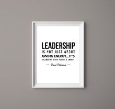 a white framed poster with the quote,'leadership is not just about giving energy it's transforming from project entry '