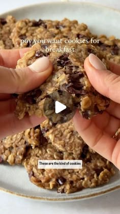 two hands holding cookies on top of a plate with words above it that reads, do you want cookies for breakfast?