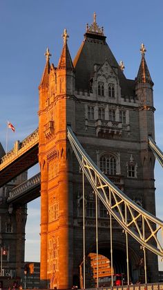 the tower bridge is very tall and has many windows