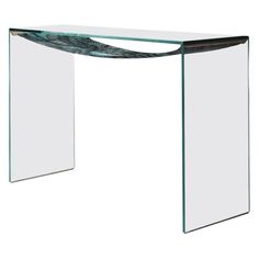 a glass and metal console table with an abstract design on the top, against a white background